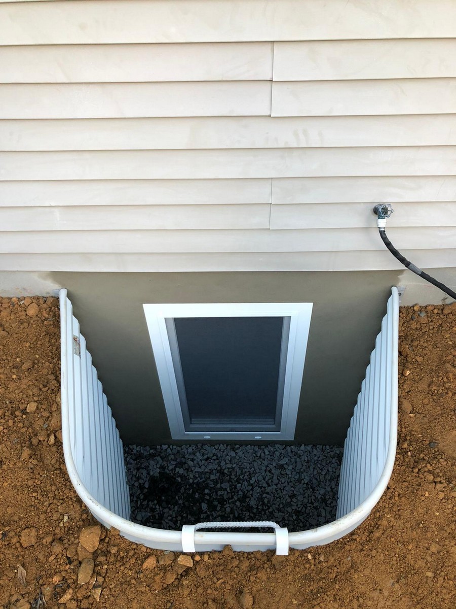 Egress window installed in Chester NJ with new drain pipe