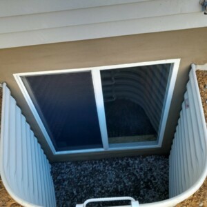 Sliding Egress Window in Belford NJ with a White 18 Gauge Steel Window Well